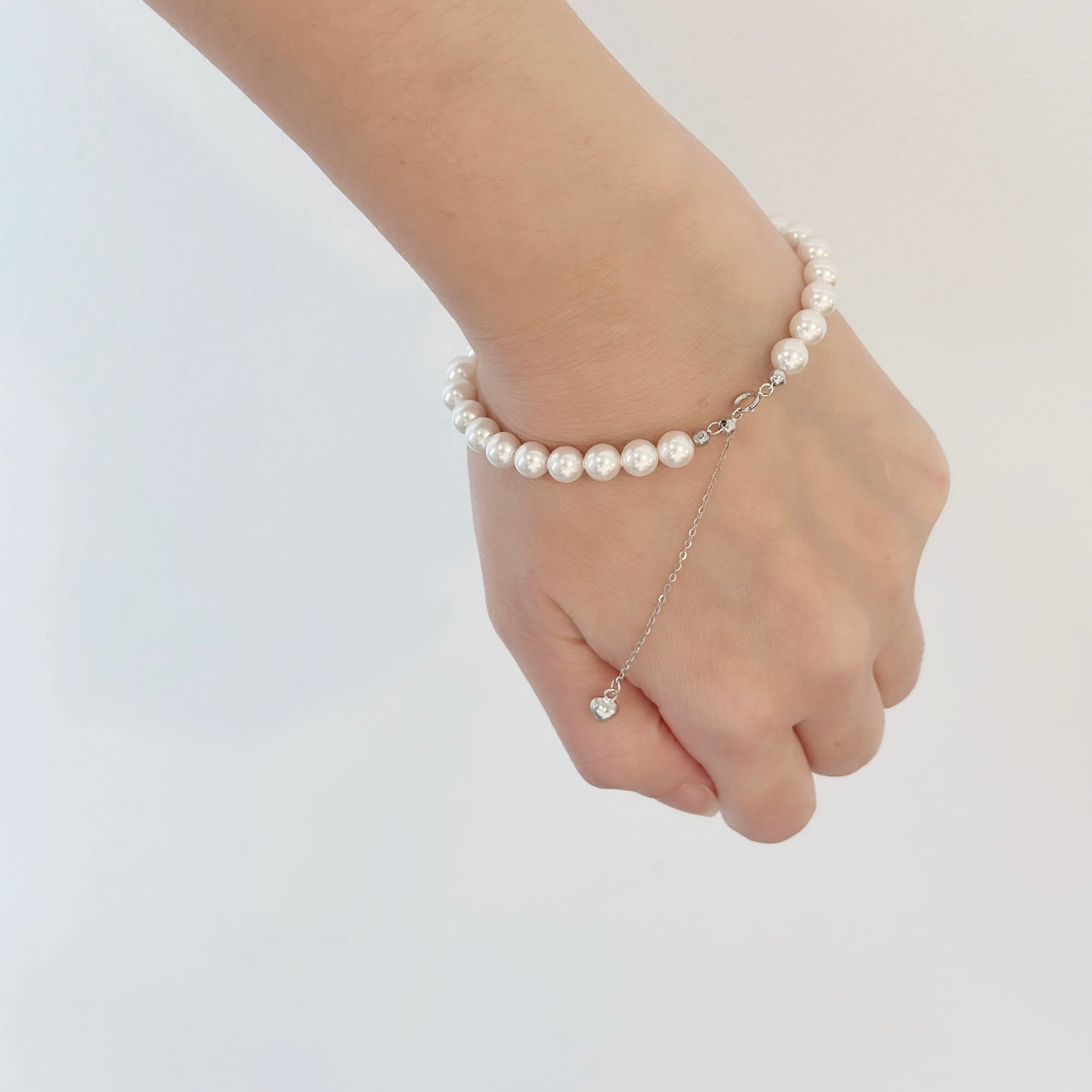 Swarovski pearl necklace pearl jewelry set Timeless Swarovski bracelet Pearl Handcrafted pearl jewelry Luxurious Swarovski pearls bracelet Swarovski pearl accessories freshwater pearl bracelet Pearl necklace Pearl bracelet Swarovski crystal pearl Korean jewelry Korean Jewelry Dainty Minimalist jewellery Malaysia Stainless steel 925 sterling silver S925 Cubic zirconia hypoallergenic magnetic birthday gift premium gift bridesmaid aurelia atelier pearl necklace malaysia pearl bracelet malaysia akoya pearl