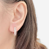 Veyra Huggie Hoop Earrings