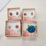 Hands-on creativity at our cozy Korean Jewelry Cafe! Dive into a fun shrink paper jewelry workshop, surrounded by warm ambiance, delicate jewelry tools, and creative energy. Perfect for crafting enthusiasts looking to make something unique! coffee cafe earrings jewelry making weekend workshop