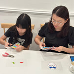 Hands-on creativity at our cozy Korean Jewelry Cafe! Dive into a fun shrink paper jewelry workshop, surrounded by warm ambiance, delicate jewelry tools, and creative energy. Perfect for crafting enthusiasts looking to make something unique! coffee cafe earrings jewelry making weekend workshop keychain brooch mother girl kid kids