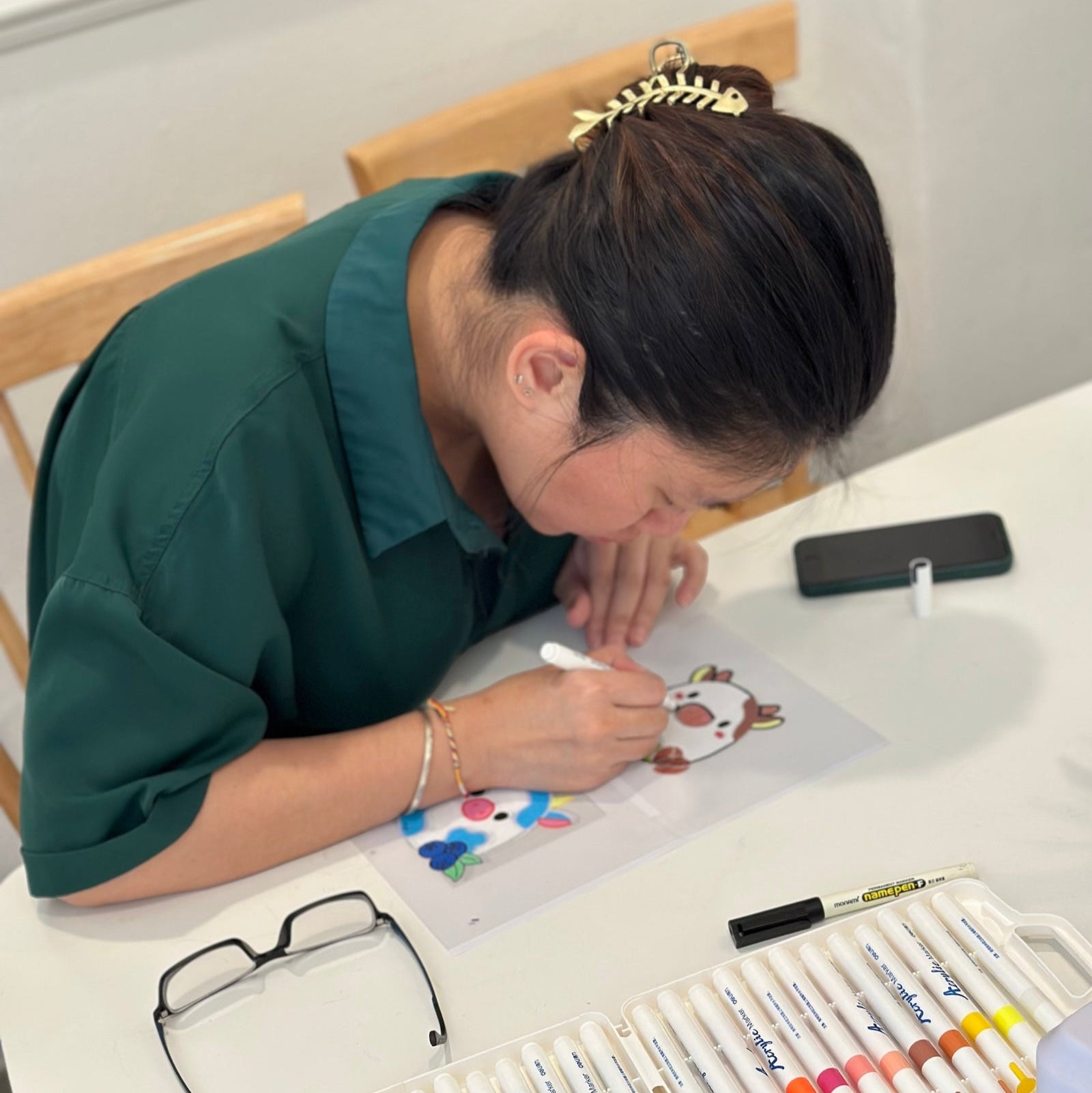 Hands-on creativity at our cozy Korean Jewelry Cafe! Dive into a fun shrink paper jewelry workshop, surrounded by warm ambiance, delicate jewelry tools, and creative energy. Perfect for crafting enthusiasts looking to make something unique! coffee cafe earrings jewelry making weekend workshop