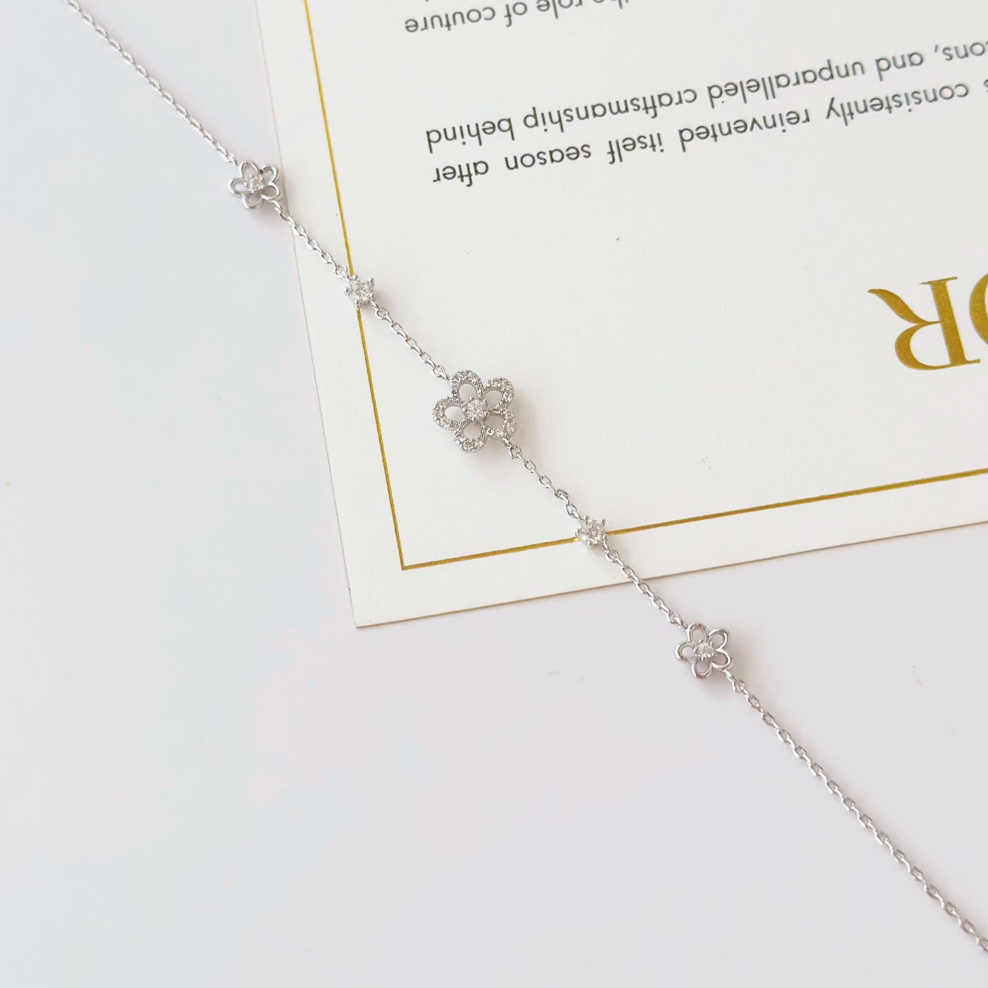 Secret Blossom Bracelet in silver / ROSE GOLD with crystal daisy flower charms
