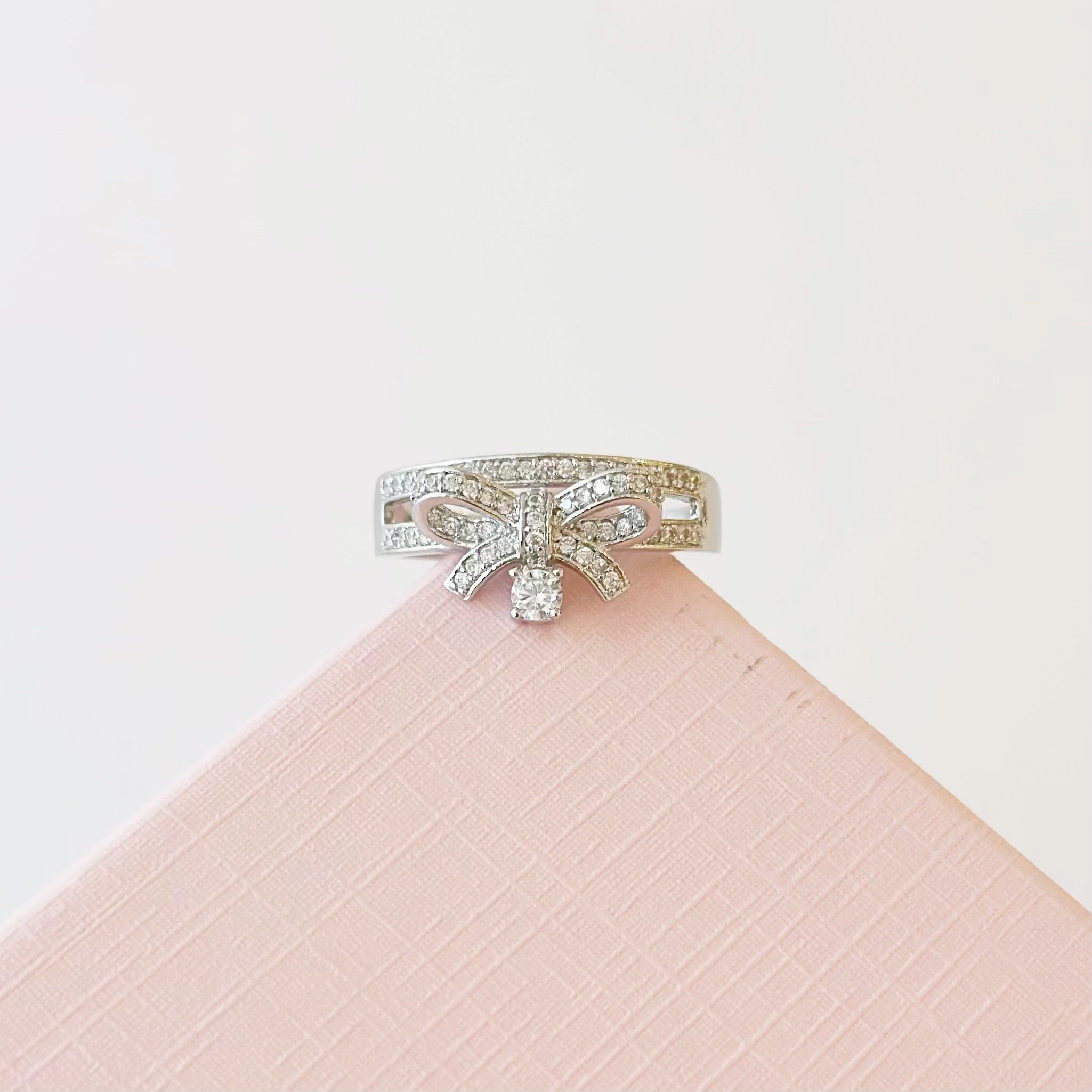 Silver Dear Love Ribbon Bracelet with pavé cubic zirconia bow design, 925 sterling silver rhodium plated, by Aurelia Atelier, IU, perfect crown, kdrama earrings, chanel earrings, ruban, 蝴蝶结耳环，镶嵌密钉立方氧化锆，925纯银镀铑, 