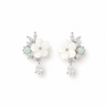 A pair of silver-toned floral drop earrings featuring white flower petals, small light green beads, and clear crystal accents, displayed on a clean white background.