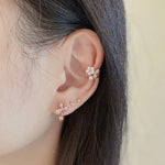 Ear Cuff Earrings Made with Brass. Ideal for Sensitive Skin. It's Non-allergenic, Hypoallergenic, Lead FREE and Nickel FREE. Embellished with Cubic Zirconia. It's similar to a diamond with its brilliance and crystal clarity but it is a synthesized (man-made) crystalline material that looks so much like a diamond.  Sold as 1 Single Piece No Piercing required Material : Brass | Plating : Rhodium Plated Size : 3.0cm*0.5cm Packaging : Includes a tag with 6cm*6cm gift box Made in Korea