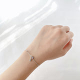 Silver Saturn Bracelet